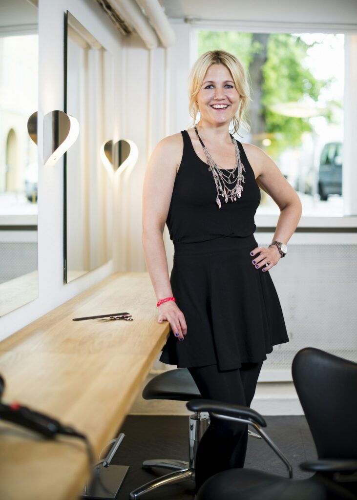 Female business owner in hair salon, portrait